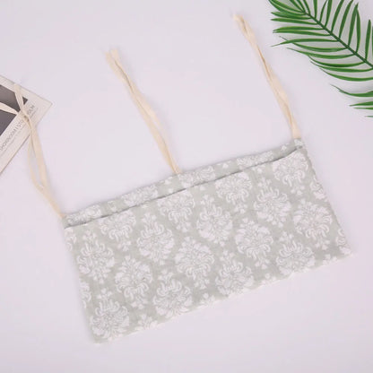 Hanging Crib Storage Bag – Baby Diaper & Toy Organizer